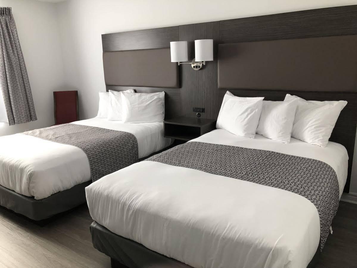 Travelodge By Wyndham Rigaud Buitenkant foto