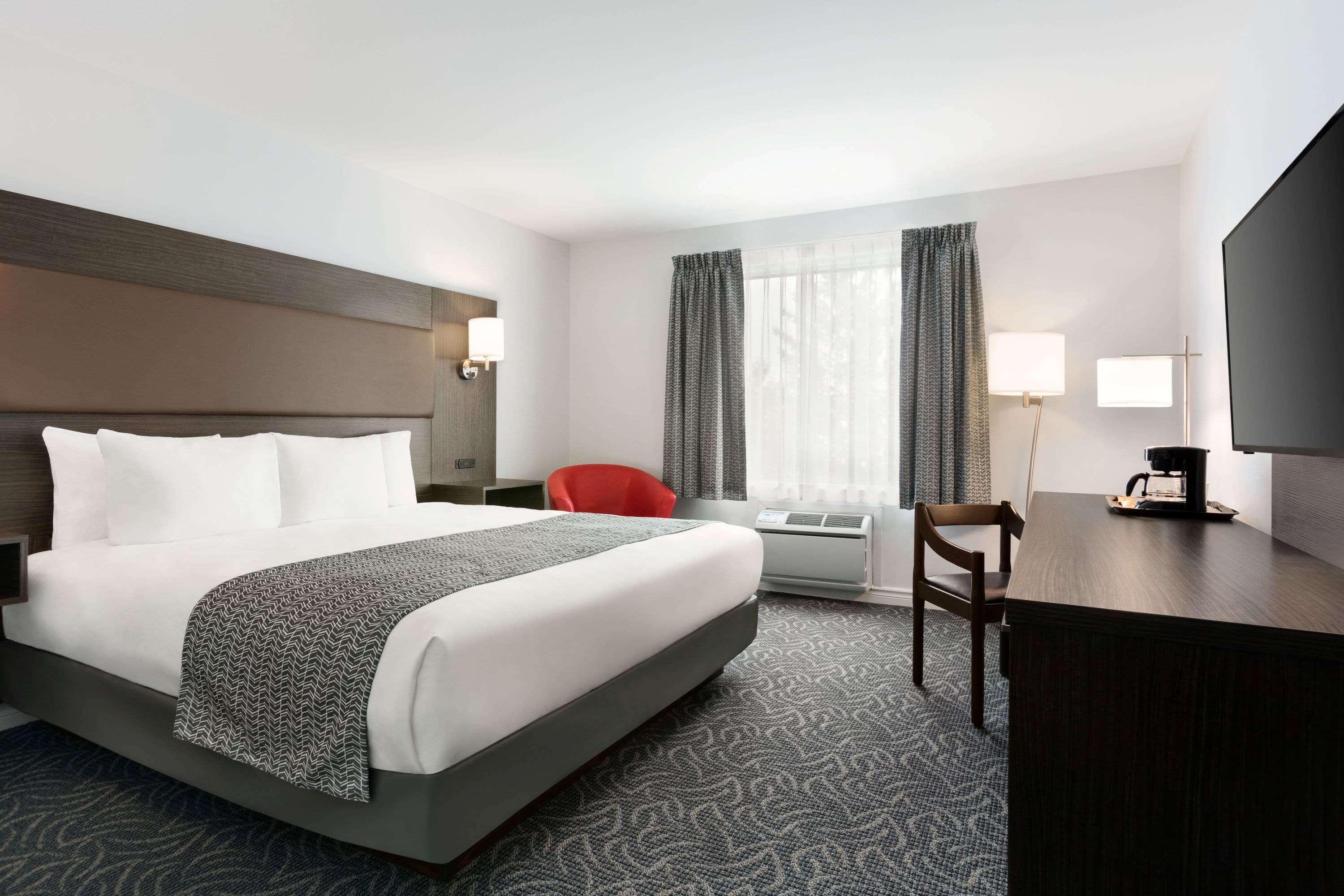 Travelodge By Wyndham Rigaud Buitenkant foto